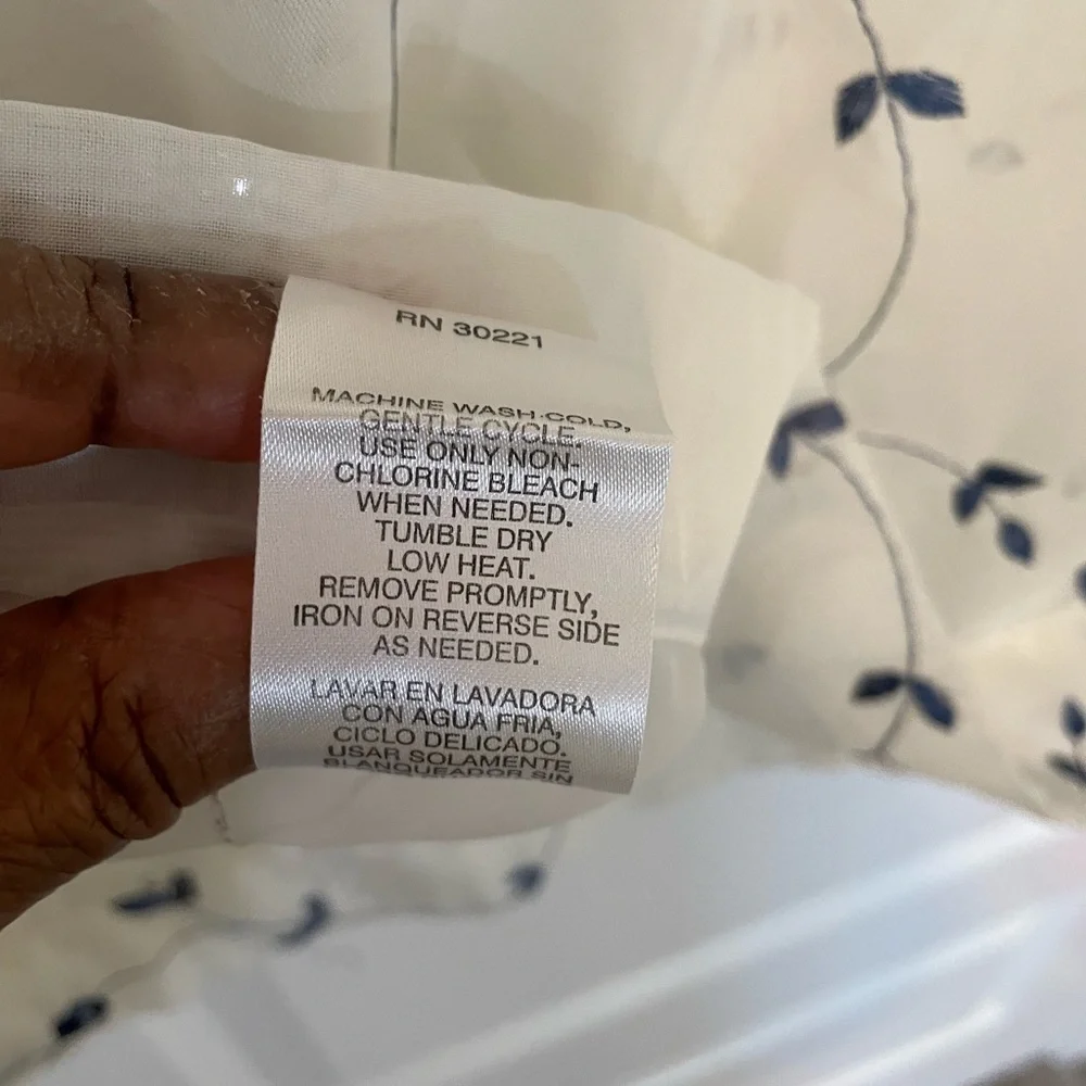 White Sheer Shower Curtains with a pattern delicate blue flowers through out